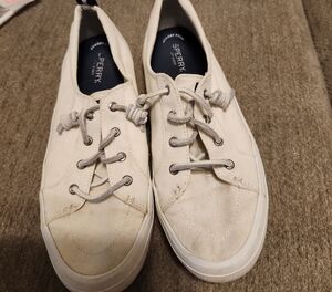 Sperry White Canvas Sneakers with Classic Comfort.